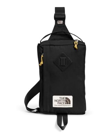 The North Face Berkeley Field Bag | Water Repellent Finish, Vintage Style Travel Essential, Sling Holds Water Bottles, Phones & Keys, TNF Black/Mineral Gold-NPF, One Size