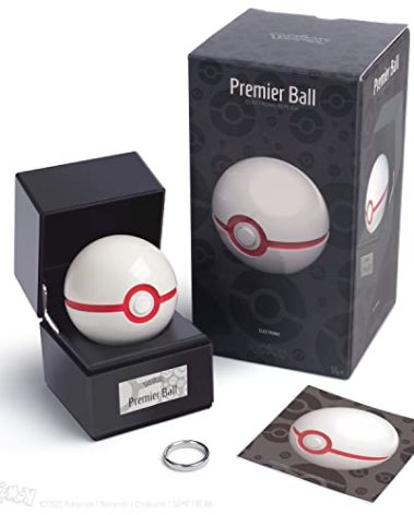 The Wand Company Original Poké Ball Authentic Replica - Realistic, Electronic, Die-Cast Poké Ball with Display Case Light Features – Officially Licensed by Pokémon