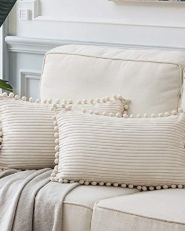 Fancy Homi Pack of 2 Boho Rectangle Decorative Throw Pillow Covers with Pom-poms, Soft Corduroy Accent Solid Cushion Case Set for Couch Sofa Bedroom Car Living Room (12x20 Inch/30x50 cm, Cream)